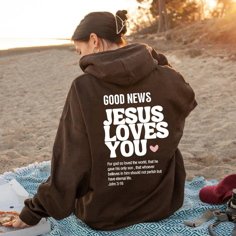 Sudadera unisex con capucha "La buena noticia es que Jesús te ama"