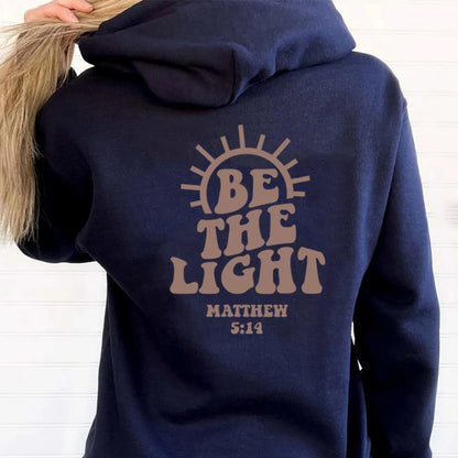 Sudadera unisex con capucha "Sé la luz"