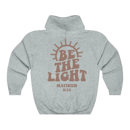 Sudadera unisex con capucha "Sé la luz"