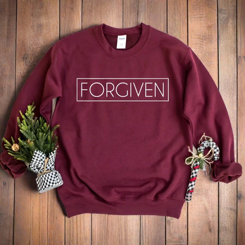 Sudadera unisex con cuello redondo "Forgiven"